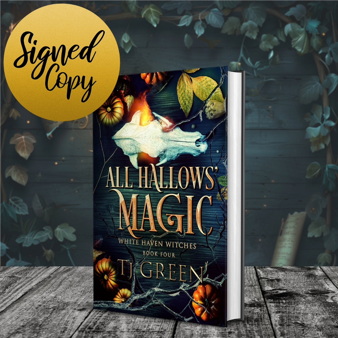 Book titled 'All Hallows' Magic' with a ghost and pumpkins on the cover, set against a dark background.