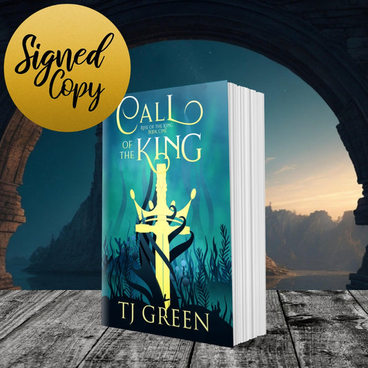 Book titled 'Call of the King' by TJ Green with a scenic background YA Arthurian Fantasy.