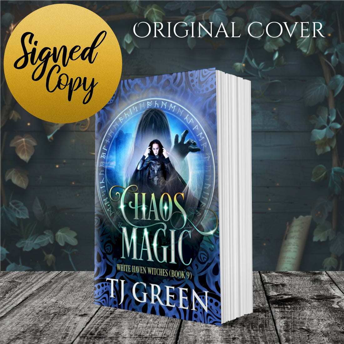 Book titled 'Chaos Magic' by TJ Green on a wooden surface with a decorative background. Paranormal witch fiction, mystery, magic, supernatural, urban fantasy.