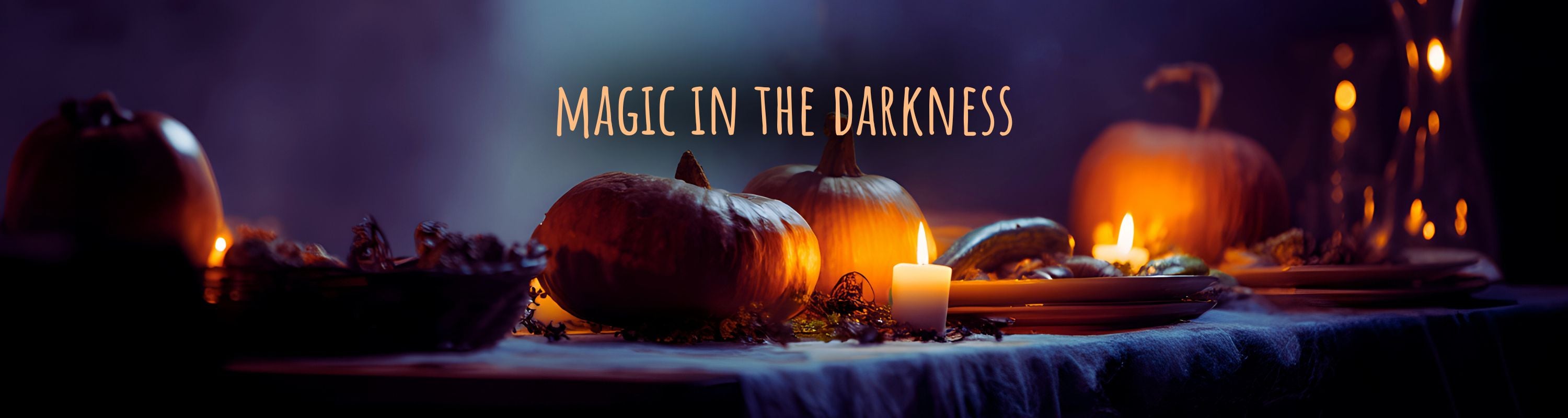 Halloween-themed table setting with pumpkins and candles, featuring the text 'Magic in the Darkness'.