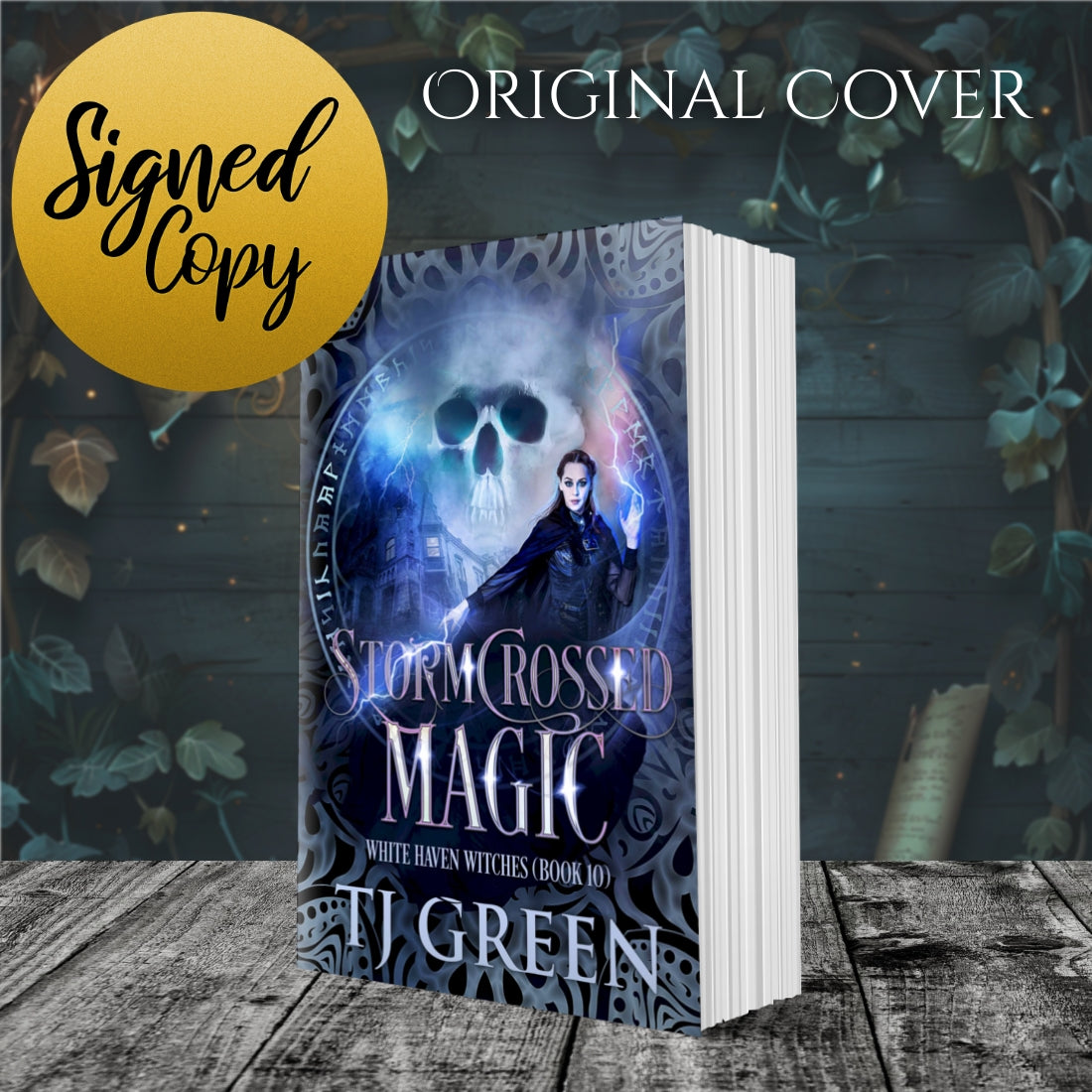 Book titled 'Stormcrossed Magic' by TJ Green with a signed copy label on a wooden surface. Paranormal witch fiction, mystery, supernatural, urban fantasy.