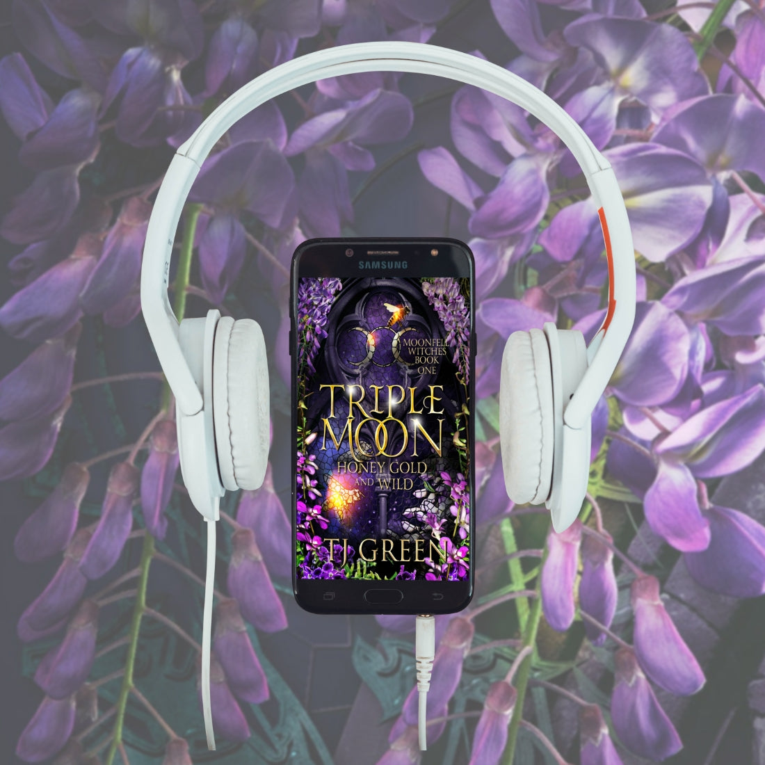 Phone with 'Triple Moon' book cover displayed, surrounded by white headphones on a purple floral background Paranormal Witch Mystery fiction, urban fantasy