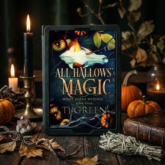 Book titled 'All Hallows' Magic' by T.J. Green with Halloween-themed decorations on a wooden surface.