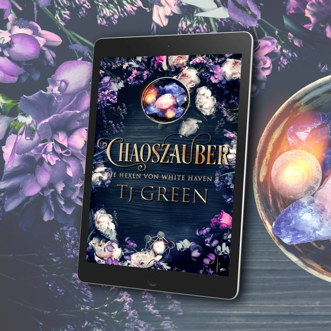 E-reader displaying the book cover of 'Chaoszauber' by TJ Green with a mystical design on a floral background.