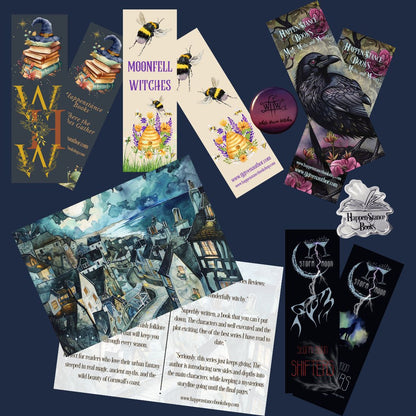 A flat lay of White Haven Witches World themed bookish stationery and printed art on a dark navy background. Visible items include several bookmarks, a small round pin, a printed card or poster with a raven illustration, a bookish piece with a crow, a bookish piece with flowers and bees, a bookish piece with stacked books and a globe, a printed scene with a castle and sea, and a white logo reading Happenstance Books.