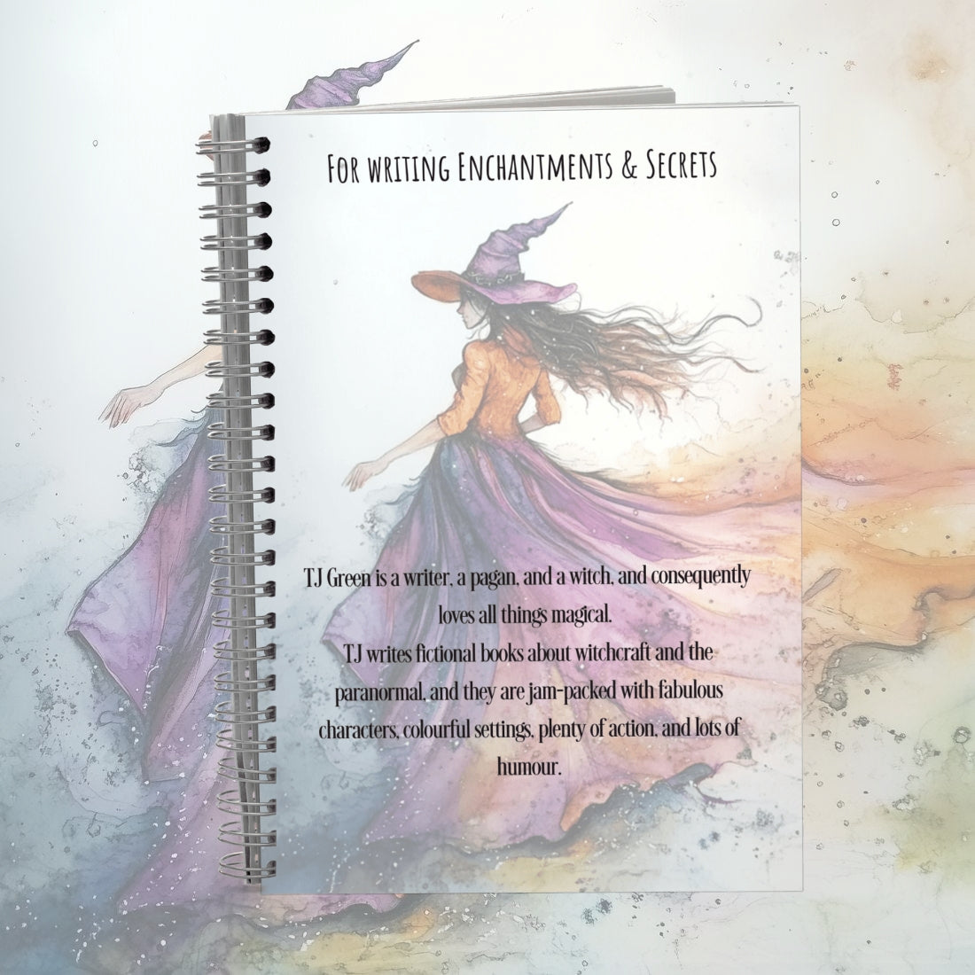 Notebook with a witch illustration and text on a pastel background
