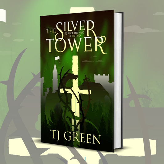 Book titled 'The Silver Tower' by TJ Green on a green background  Rise of the King #2, Arthurian Fantasy, Magic, dragons, adventure, Merlin.